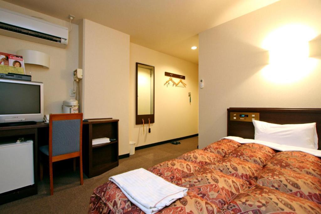 Urban Hotel Kokubu Kirishima Zimmer foto